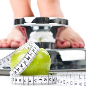 Vægt, målebånd og æble - BMI beregner
